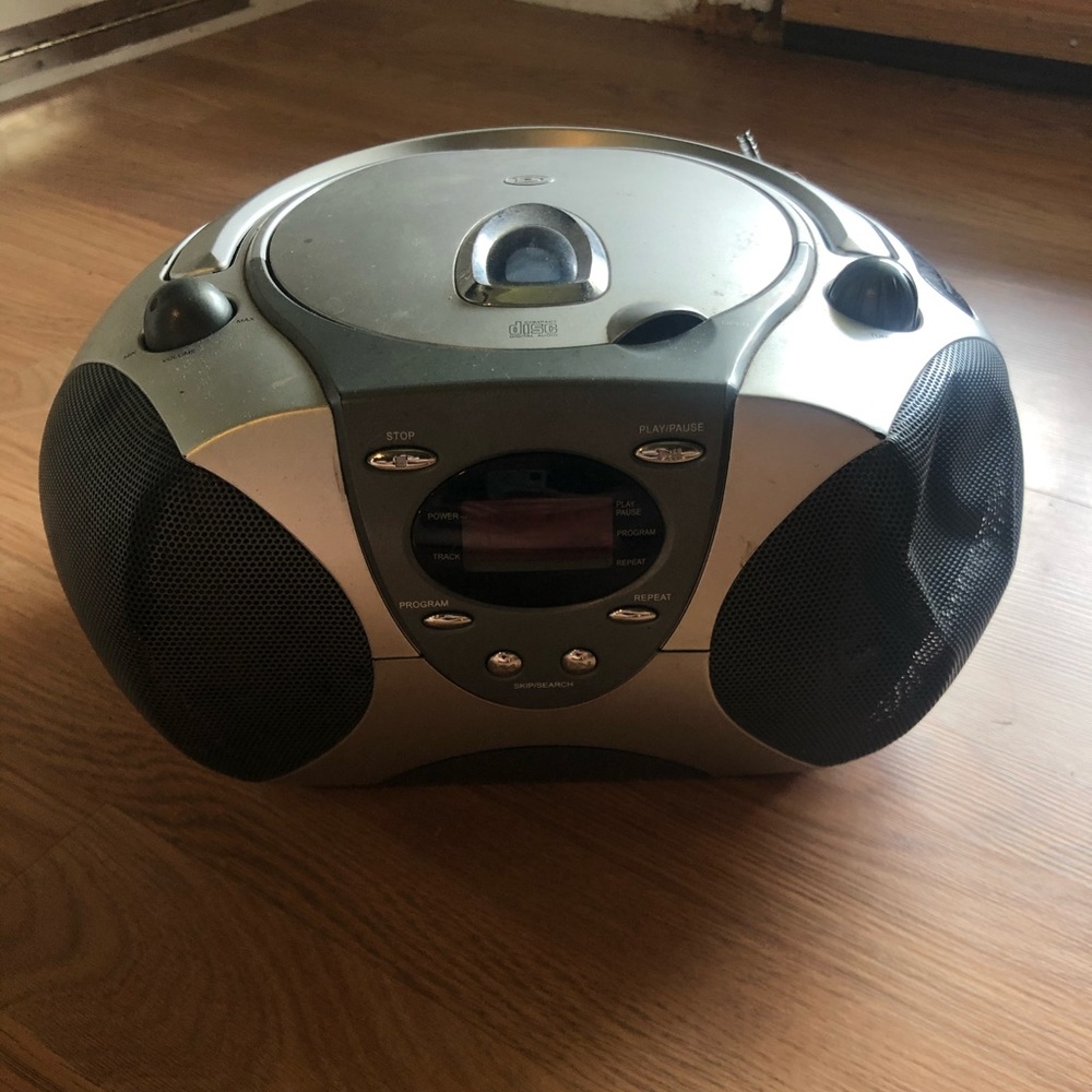 Portable radio with a disc slot